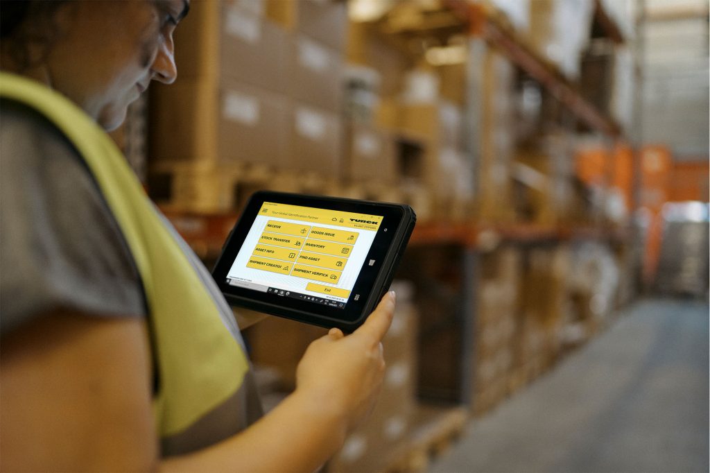 A person with a tablet computer