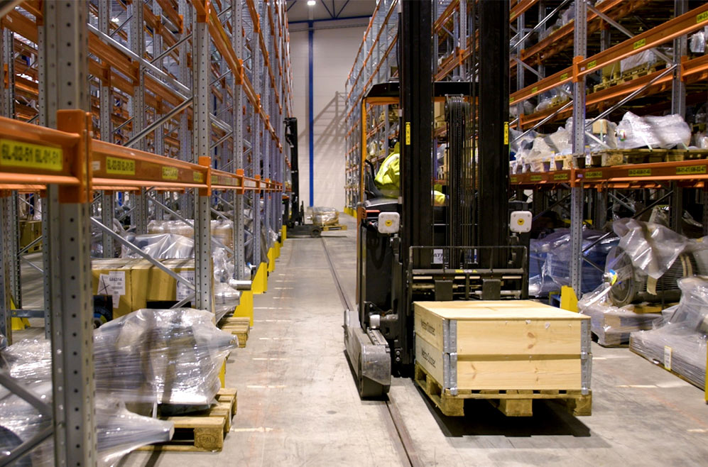 a forklift in a production warehouse with RFID readers