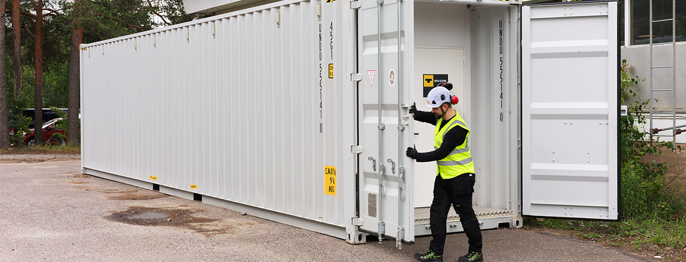 A sea container opened up to show case the fitting of rfid checkouts and self-service